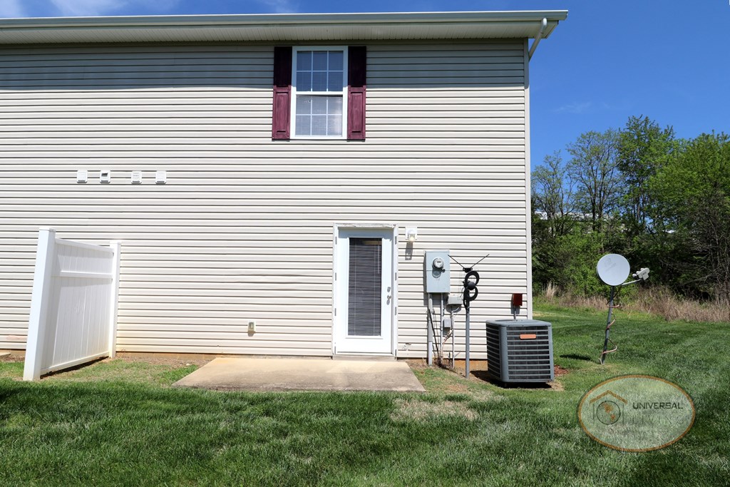 Apartment Rear Patio with privacy wall.