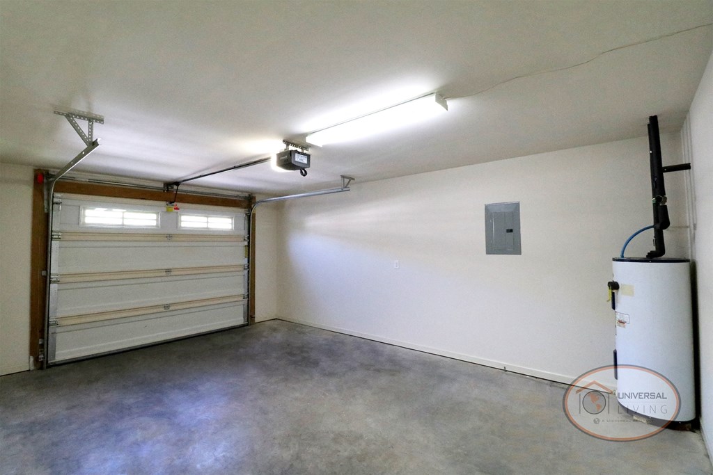 A garage with water heater.