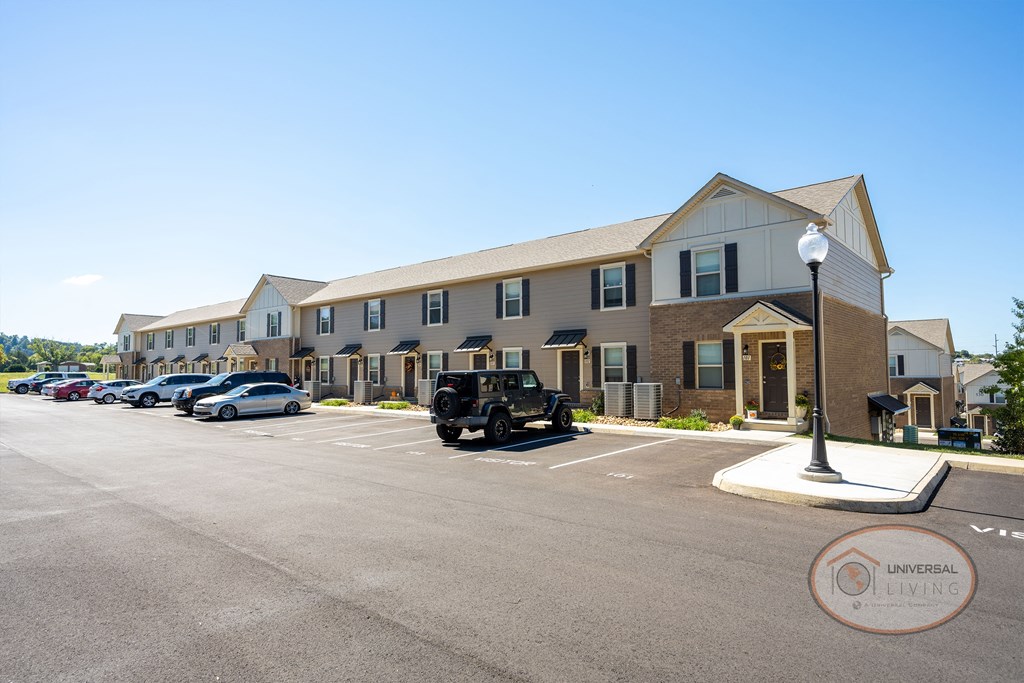 2 and 3 bedroom apartment homes with tan siding.