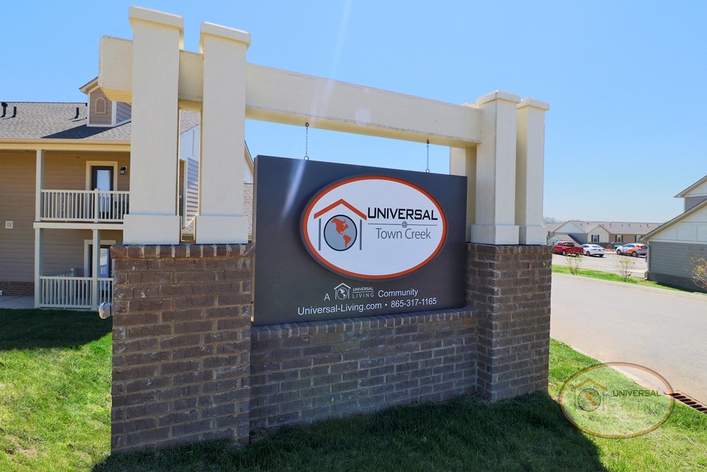 The property sign that reads Universal at Town Creek.