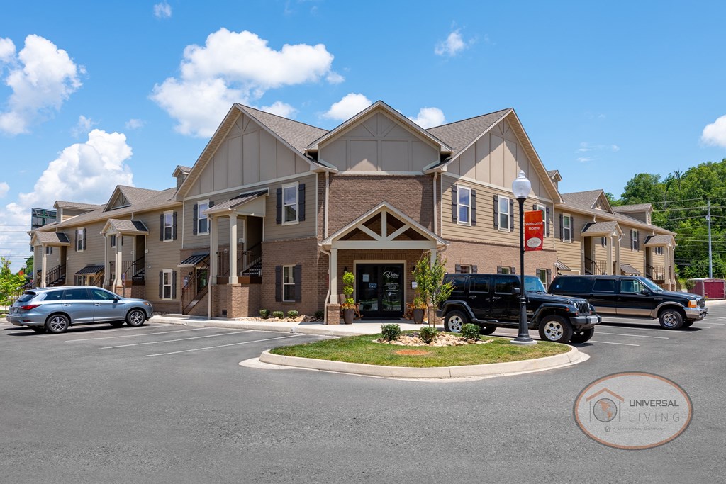 Clubhouse building with ample parking.