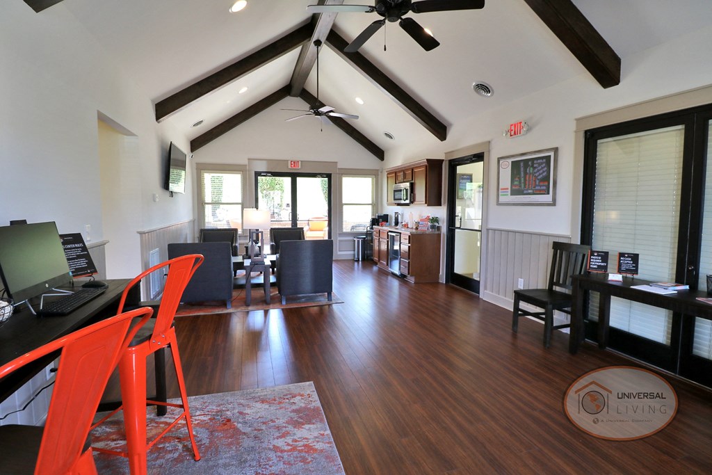 The clubhouse lounge, complete with coffee bar, flat screen TV, and lounge seating..