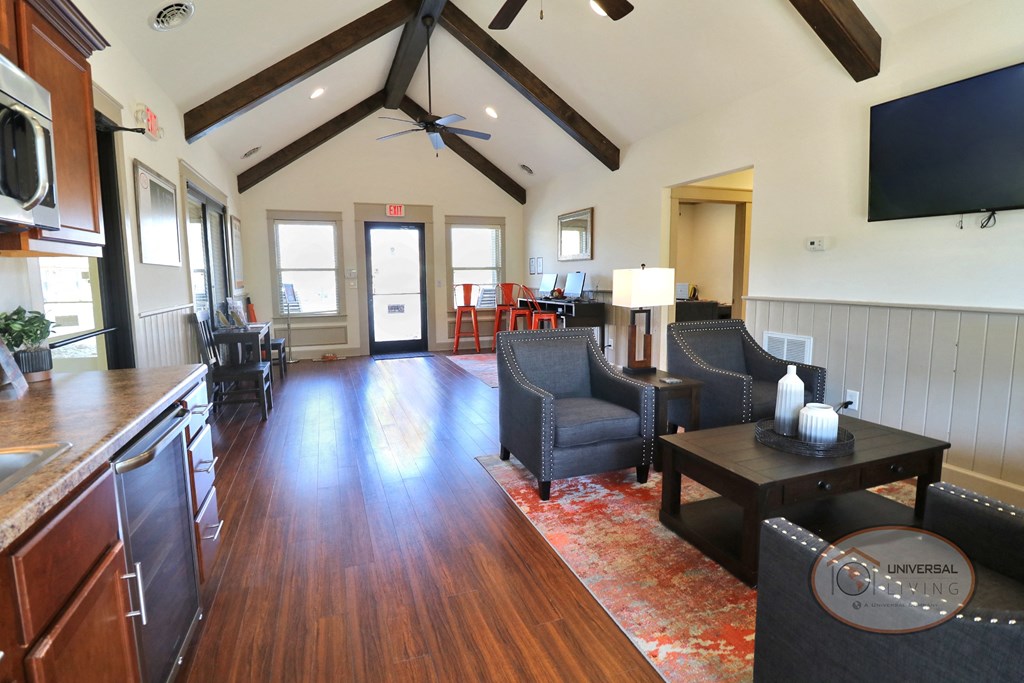 The clubhouse lounge, complete with coffee bar flat screen TV, and lounge area.