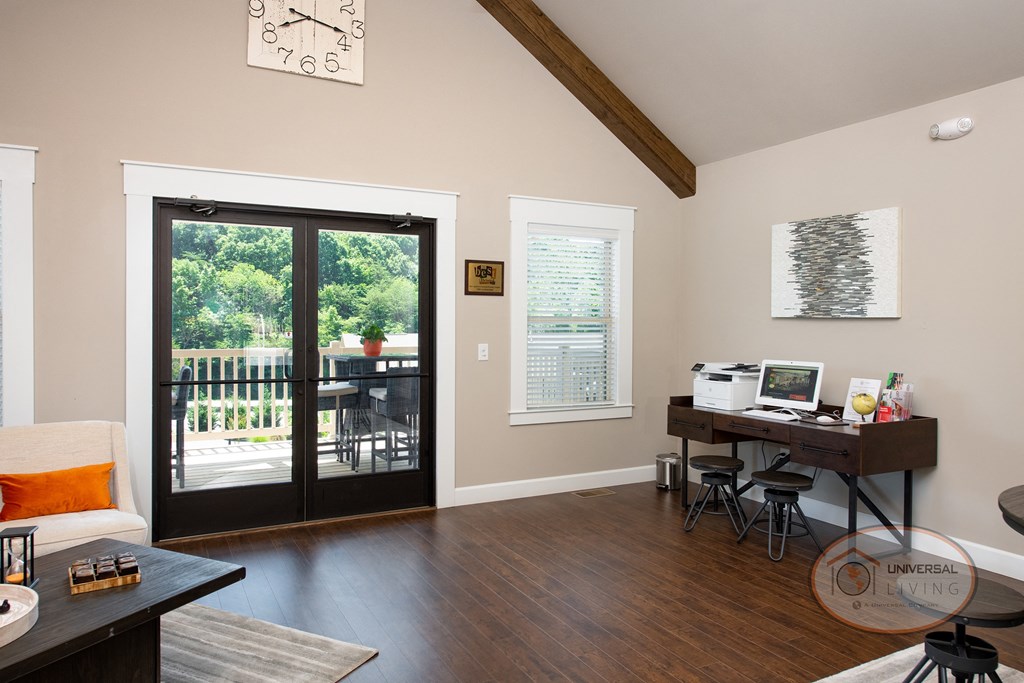 A business center with computer and printer.