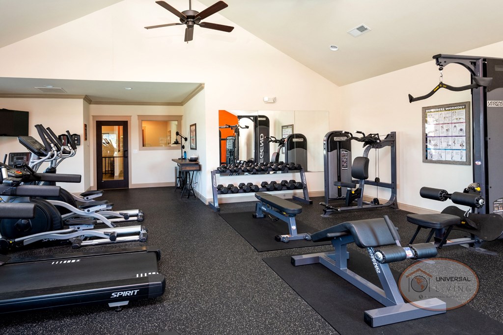 A fitness center with weight training and cardio equipment.