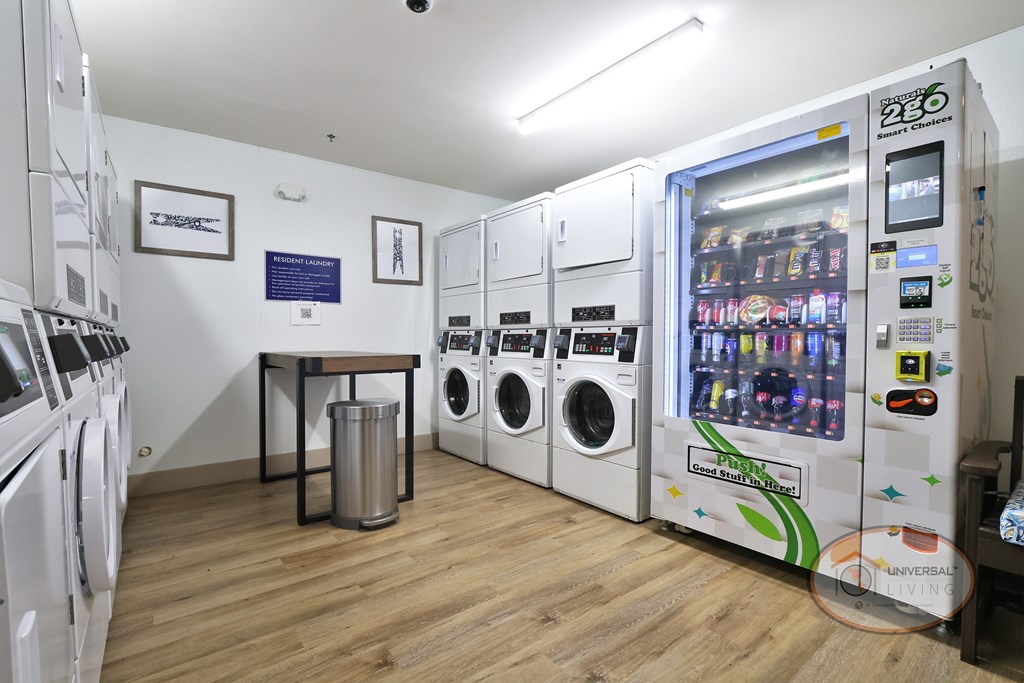 The on-site laundry center for residents with washers, dryers, and seating.