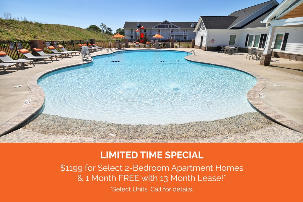 A pool with an orange banner that reads