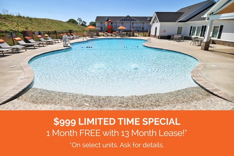 A swimming pool with a sign offering a special deal.