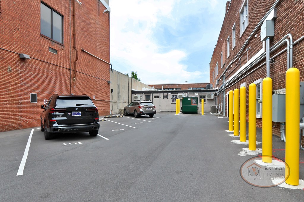 A close up view of a small private parking lot at The Henry on Main.