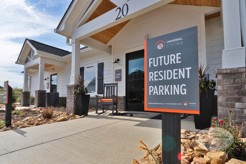 A sign reading "future resident parking" in front of the clubhouse.