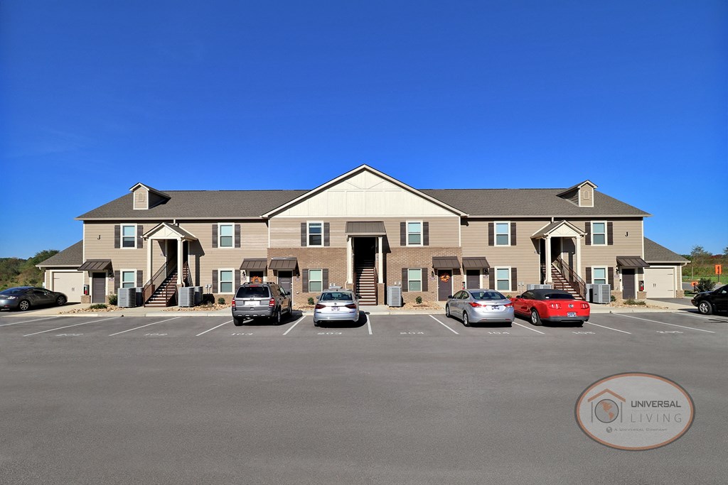 The front of a one bedroom stacked apartment home.