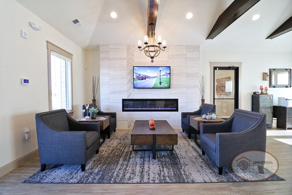 The clubhouse lounge, complete with coffee bar, fireplace, flat screen TV, and lounge area.