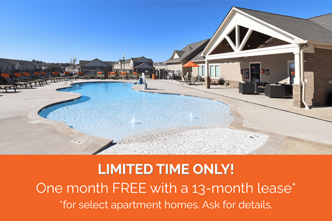 A pool area with a sign offering a free month with a 13-month lease for select apartment homes.