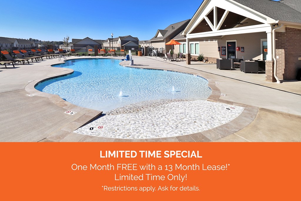 A pool with an orange banner that says "LIMITED TIME SPECIAL: One Month FREE with a 13 Month Lease!* Limited Time Only! *Restrictions apply. Ask for details."