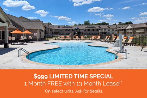 an image of a swimming pool with apartments in the background