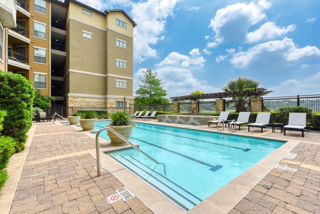 our apartments have a resort style pool with lounge chairs