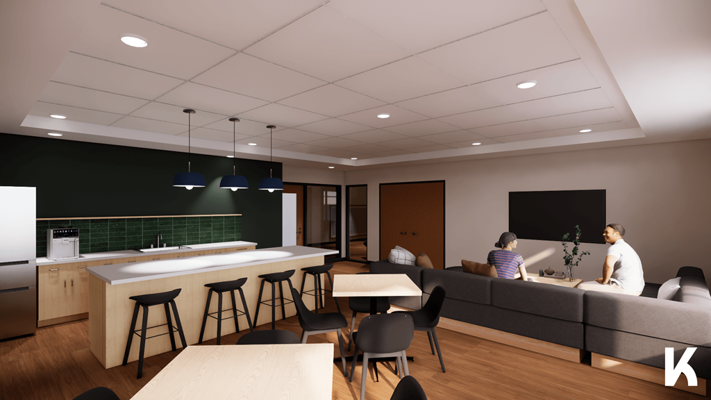 A modern kitchen with a bar area and people sitting on the couch.