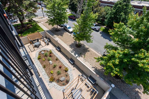 a view of the courtyard and parking lot from the top of the building