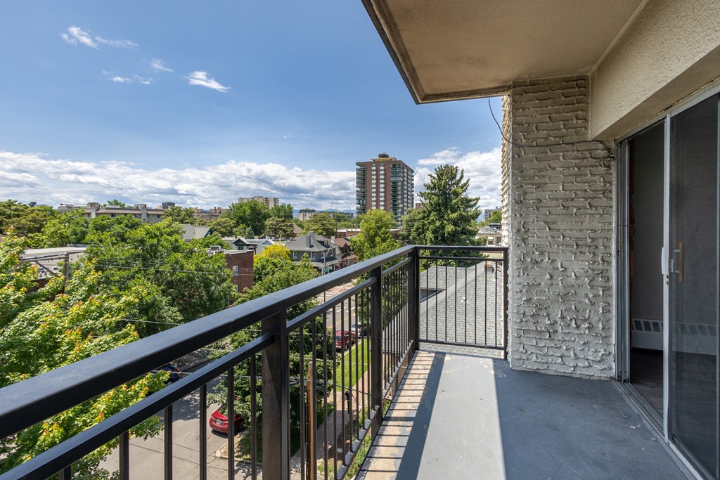 one of two balconies at the whispering winds apartments in pearland, tx