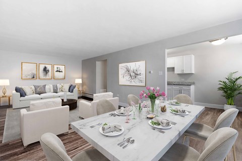 a living room with a marble dining table
