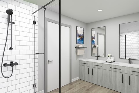 A bathroom with a white tiled shower area and a white sink vanity.