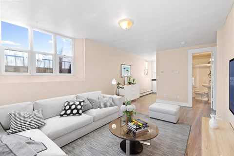 a living room with a couch and a coffee table