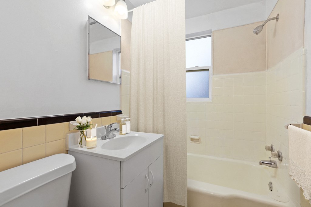 a bathroom with a sink and a bathtub