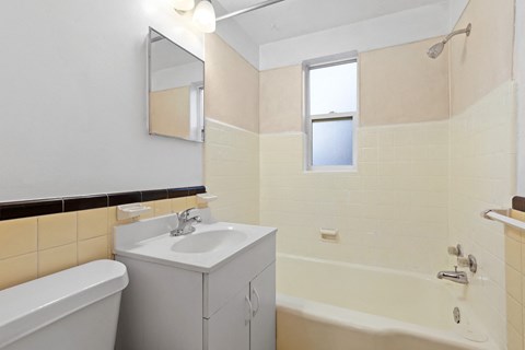 a bathroom with a sink and a bathtub