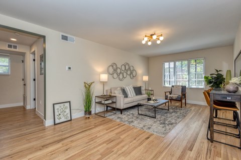 a living room with a couch and a table