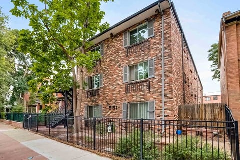 A brick building with the number 361 on it.