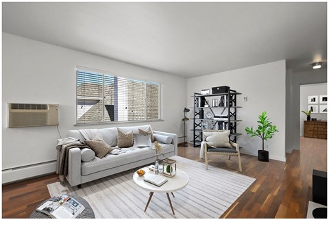an open living room with a couch and a table