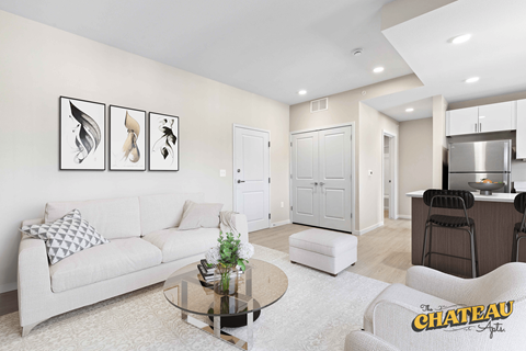 a living room with a couch and a table