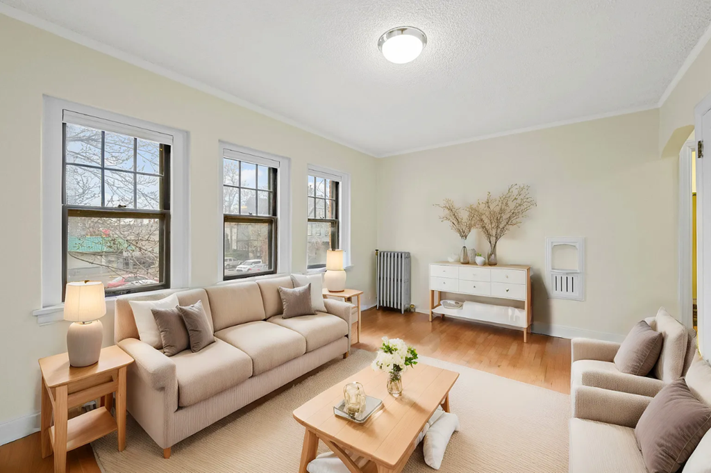 a living room with a couch and a table