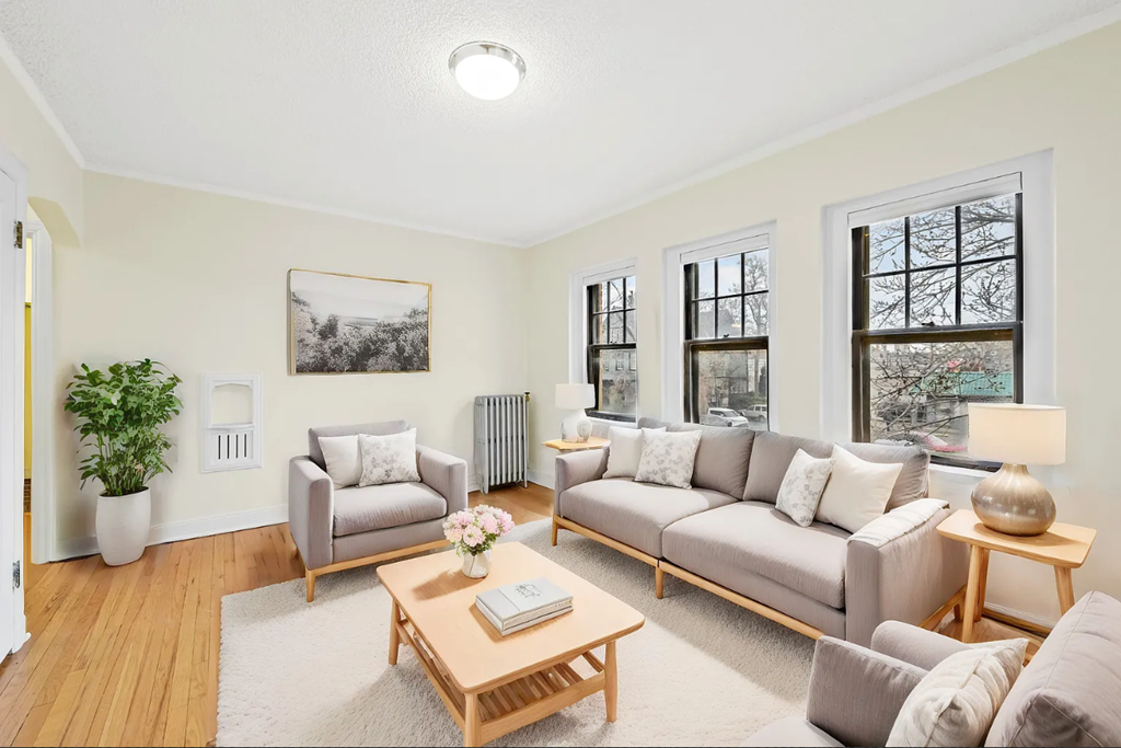a living room with two couches and a coffee table