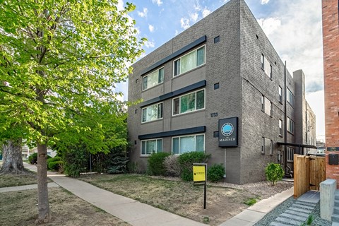 A modern building with a sign that says "Mariner".