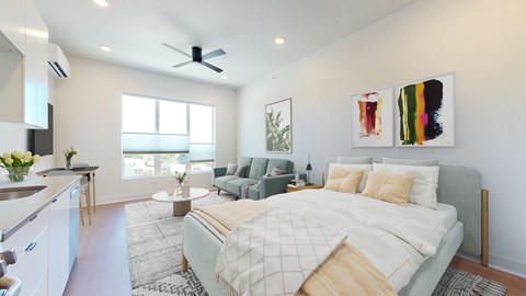 A bedroom with a large bed and a painting on the wall.