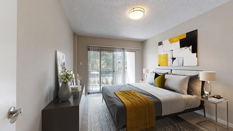 A bedroom with a bed, nightstand, and a painting on the wall.