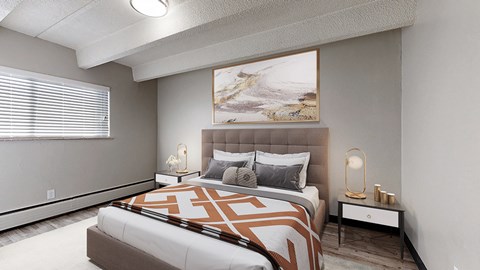 A bedroom with a large bed and a painting on the wall.