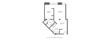 A floor plan of a small apartment with a bedroom, living area, dining area, kitchen, bath, and entry.