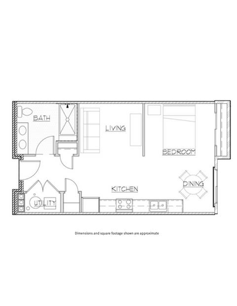 A floor plan of a small apartment with a living room, bedroom, kitchen, and bathroom.