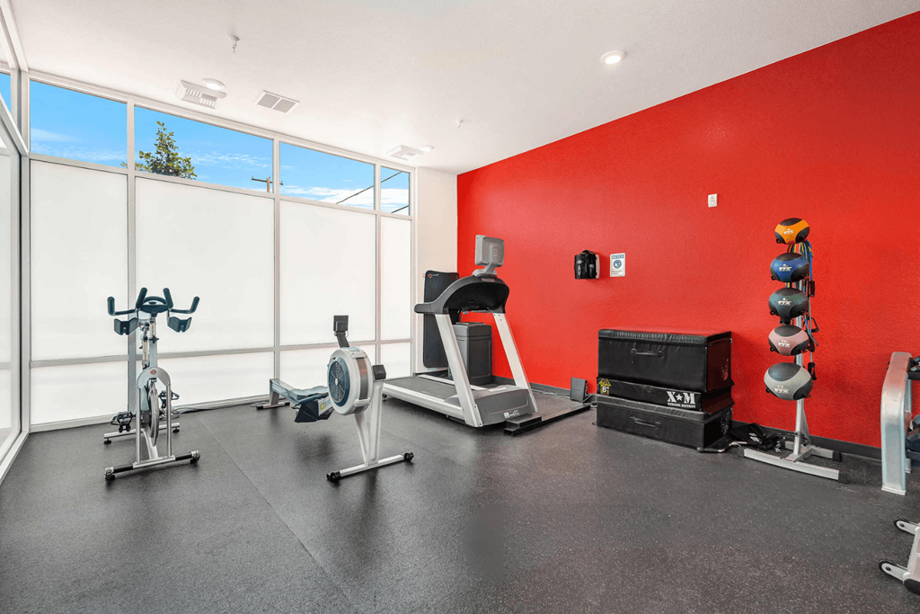 the gym at the flats at big tex apartments