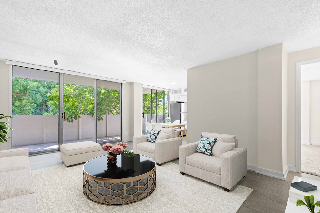 a living room with couches and a coffee table