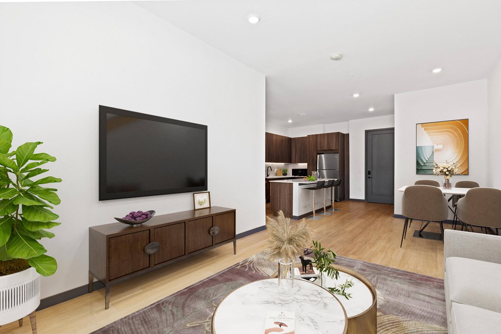 a living room with a tv and a table