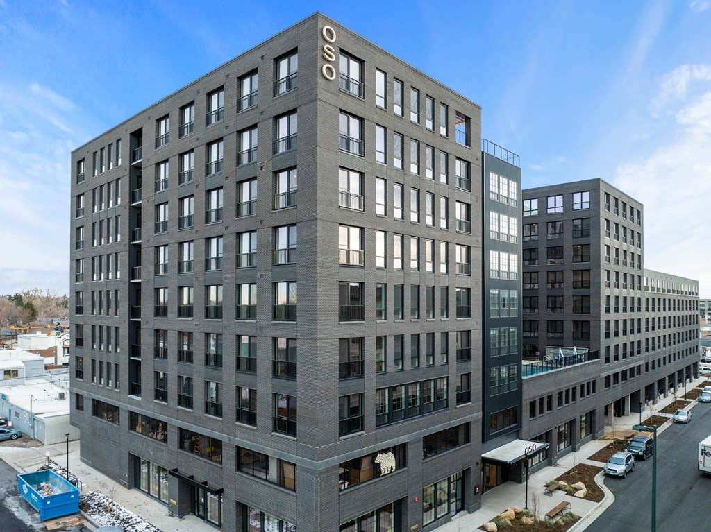 A large grey building with the number 050 on it.