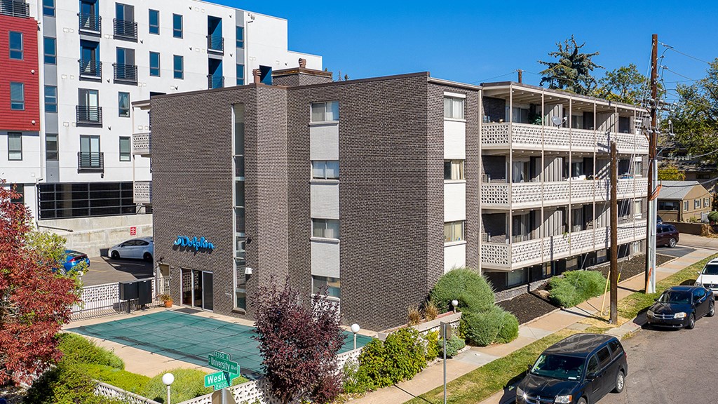 A building with a blue sign on it.