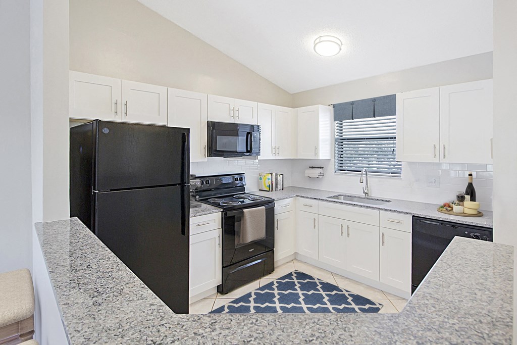 Kitchen with White Cabinets