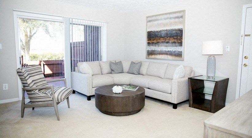 a living room with a couch and a coffee table