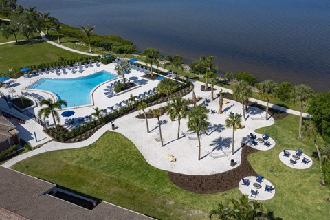 an aerial view of the pool at the resort at longboat key club