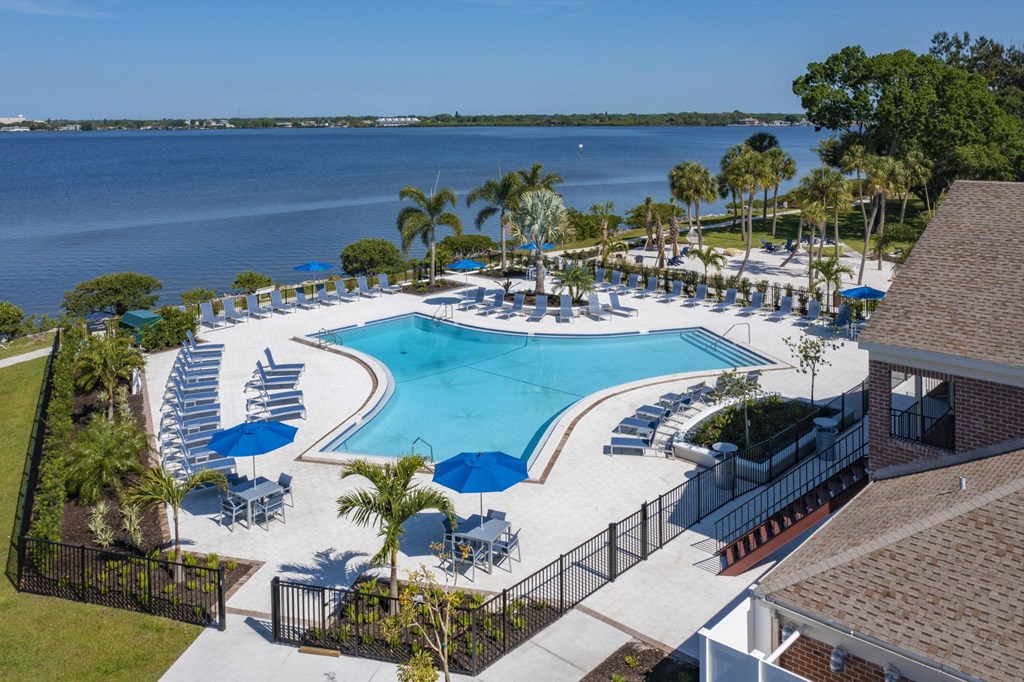 an aerial view of the pool at the resort at longboat key club