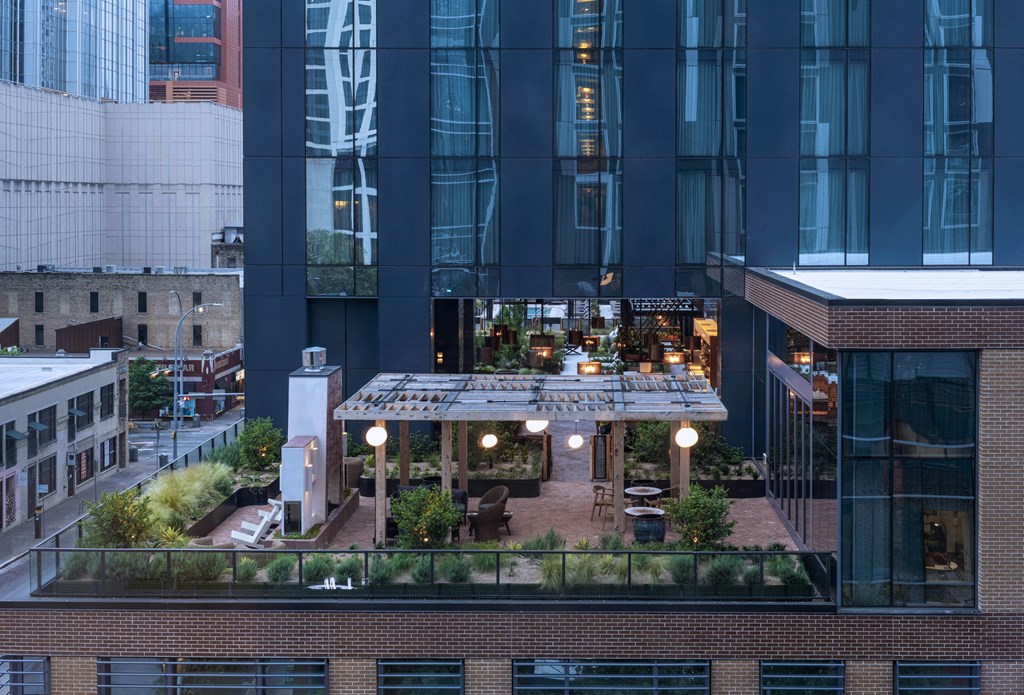 an elevated view of a building with an outdoor patio